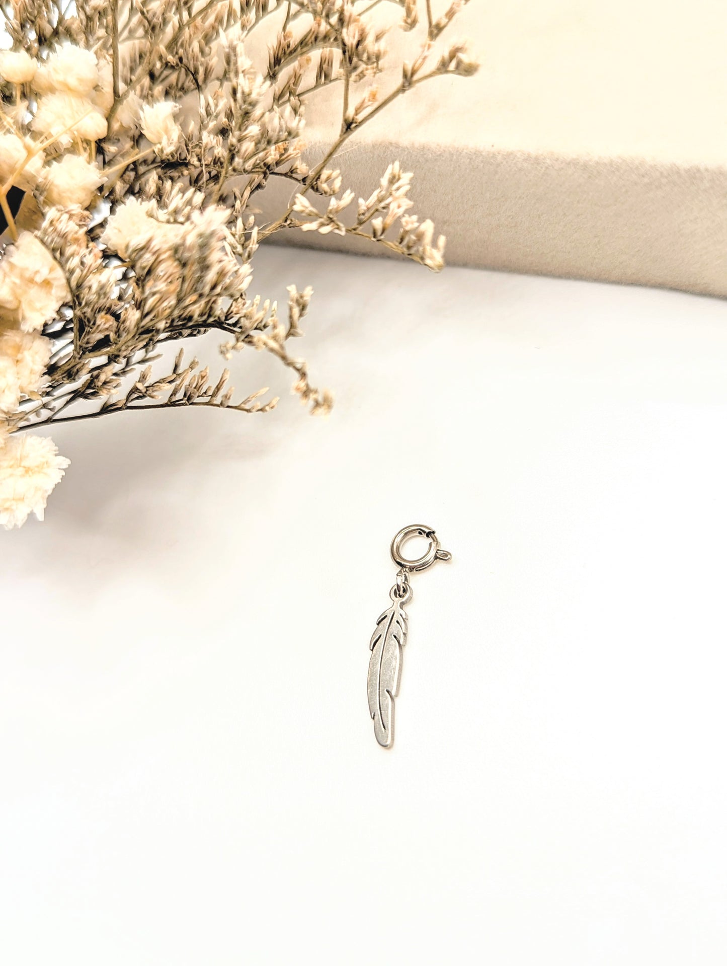 Tiny Slim Feather Charm (silver)