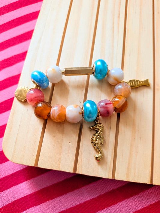 A Sea Splash Bag Charm (Gold)